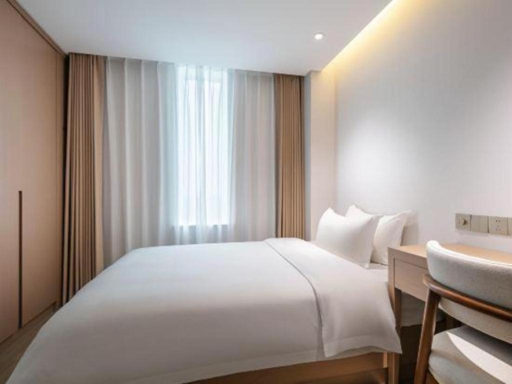 Howard Johnson By Wyndham Sunshine Plaza Нинбо Экстерьер фото